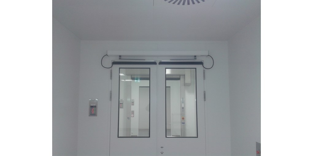 Slim swing door operators